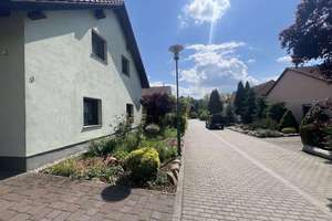 Familienfreundliches Einfamilienhaus mit Garten & Fußbodenheizung in ruhiger Lage von Bad Düben! – Rotkehlchenweg 3, 4849 Bad Düben – Vorschaubild 2