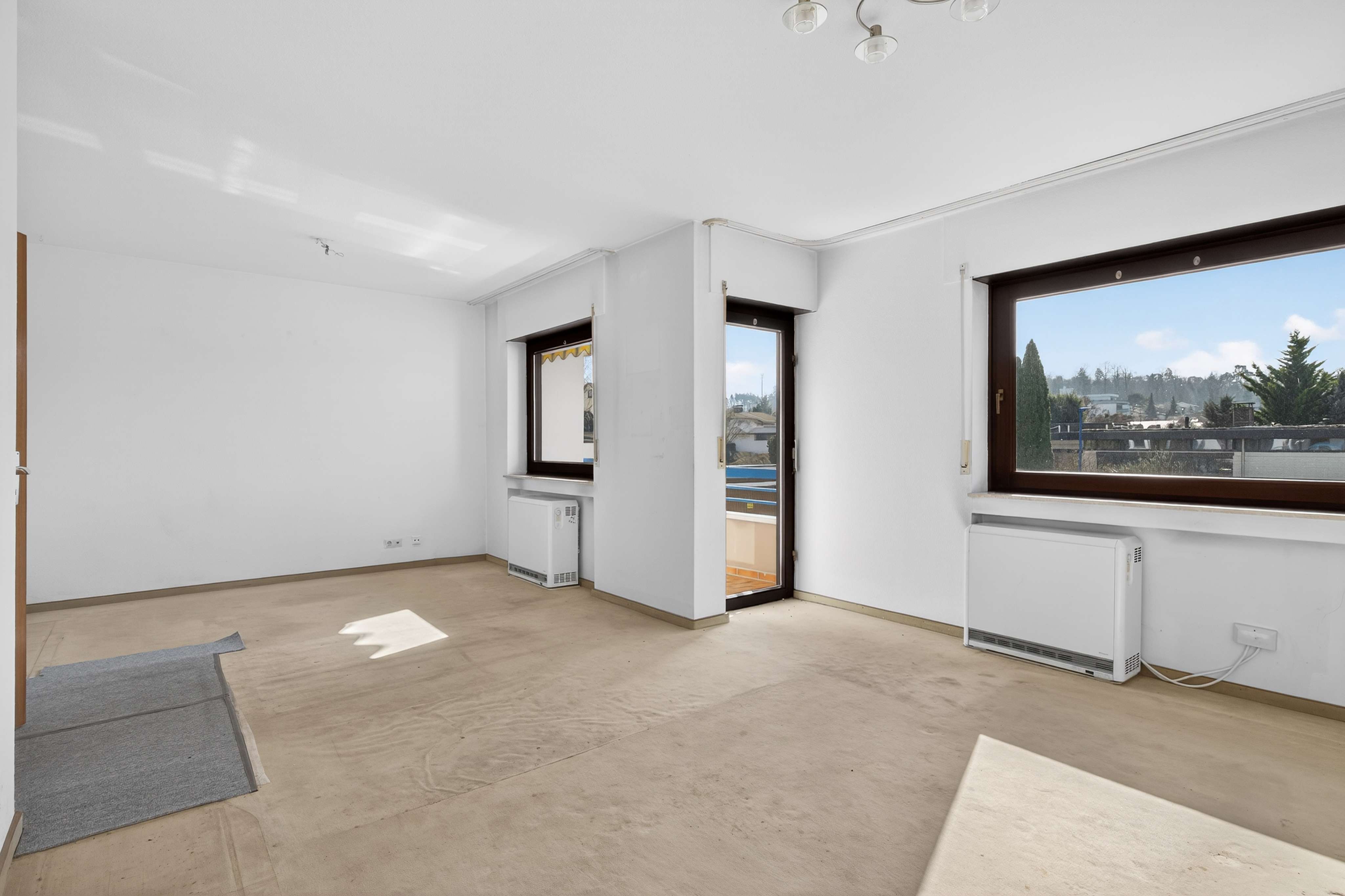 Immobilie in Waldbronn - Helle, geräumige 2-Zimmer-ETW mit Südwestbalkon in Waldbronn-Etzenrot - Bild 1