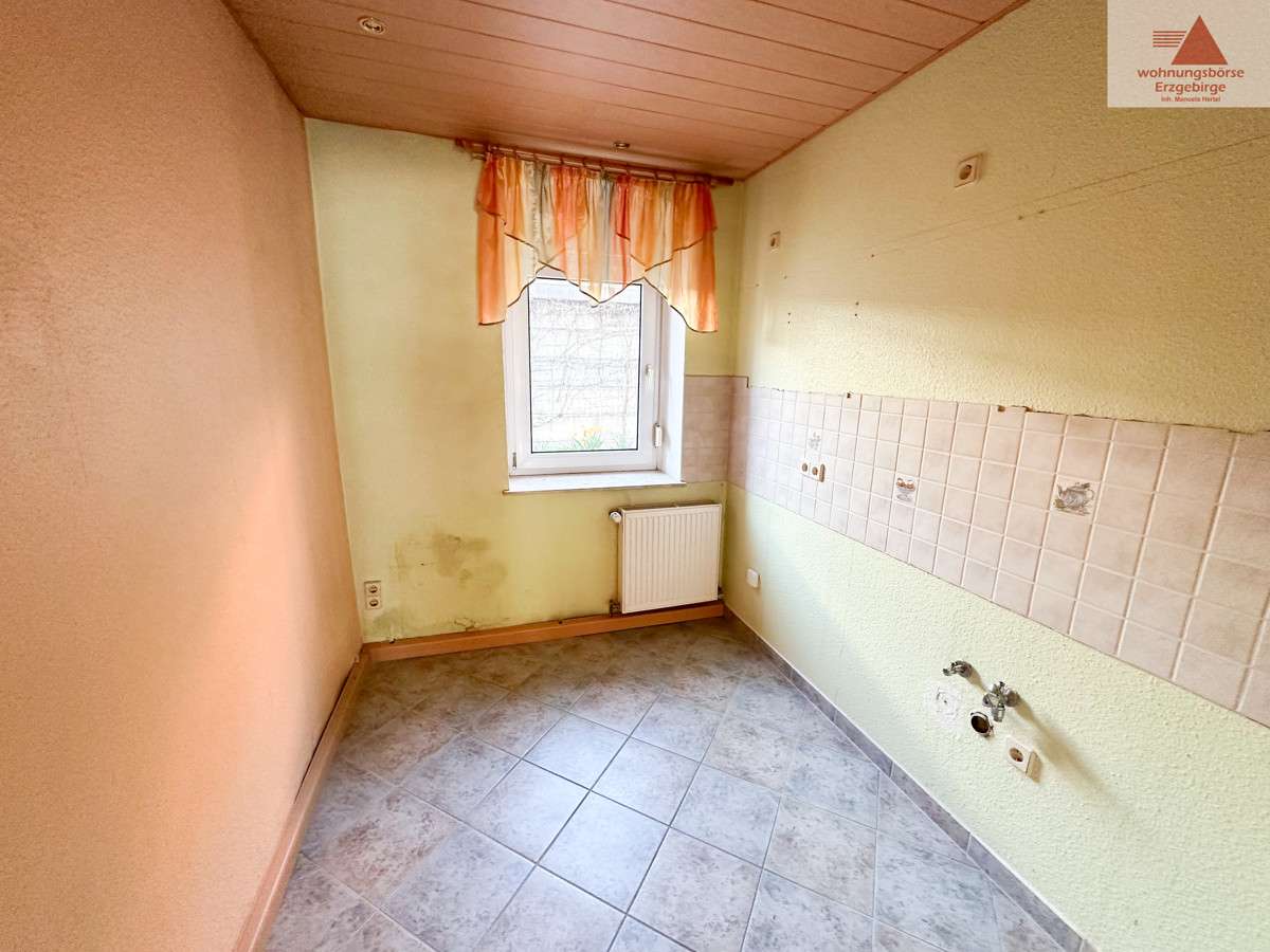 Immobilie in Lößnitz - Reihenmittelhaus in Lößnitz mit 6 Zimmern: Einfamilienhaus zentrumsnah mit Erweiterungspotential - Bild 0