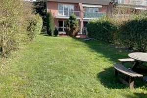 Stilvolle Maisonette-Wohnung mit Garten und Tiefgarage