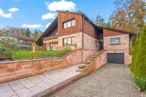 Luxuriös wohnen, sicher leben: Großzügiges Einfamilienhaus in idyllischer Lage von Igensdorf – Die vollständige Adresse der Immobilie erhältst du vom Anbieter., 91338 Igensdorf – Vorschaubild 2