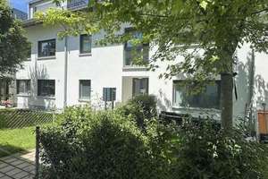 Exklusives Wohnen in Neubiberg: Moderne Eigentumswohnung mit Garten & Stellplätzen