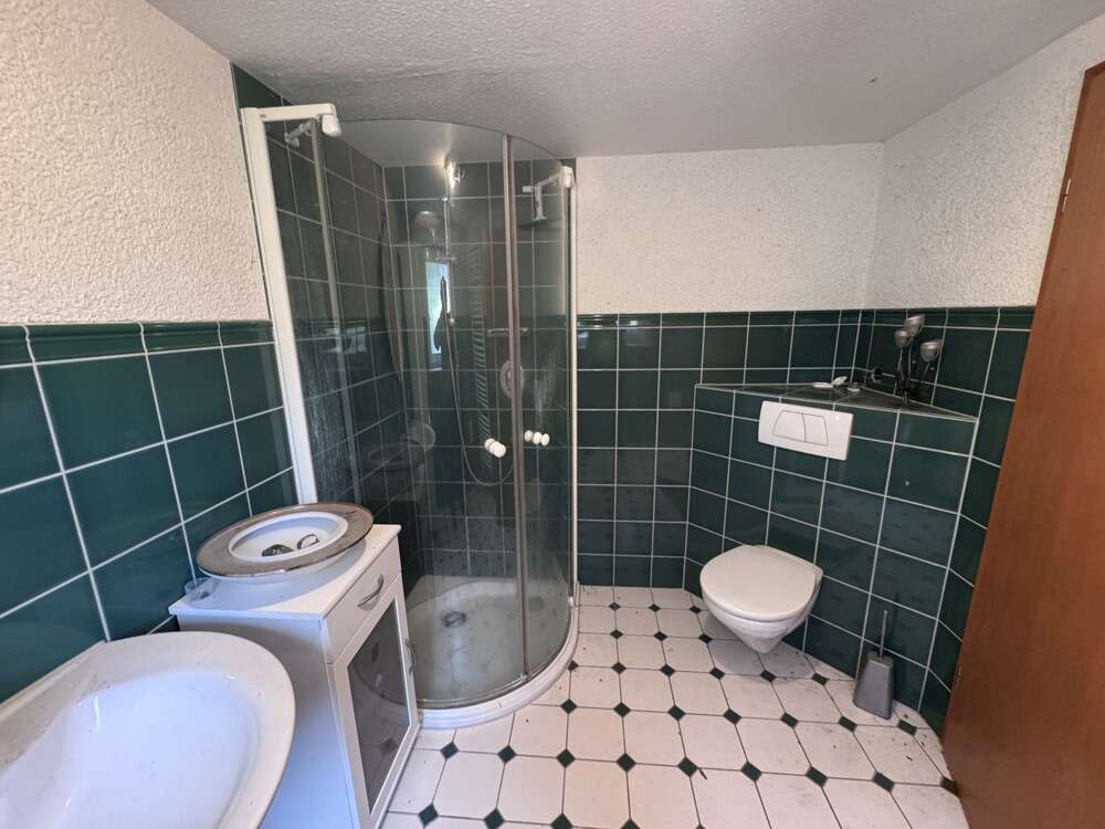 Immobilie in Bergen auf Rügen - Ihr neues Familienparadies auf Rügen: Doppelter Wohn(t)raum mit Charme und Platz! - Bild 2