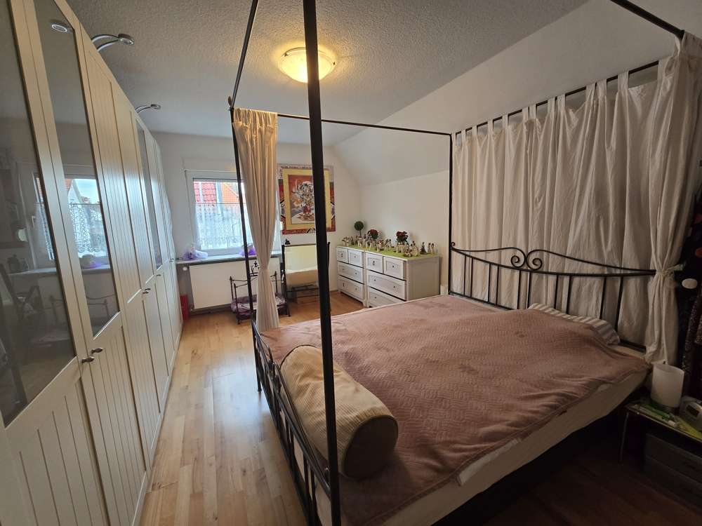 Immobilie in Büttelborn - Charmantes Einfamilienhaus mit viel Platz für die ganze Familie in Büttelborn - Bild 1