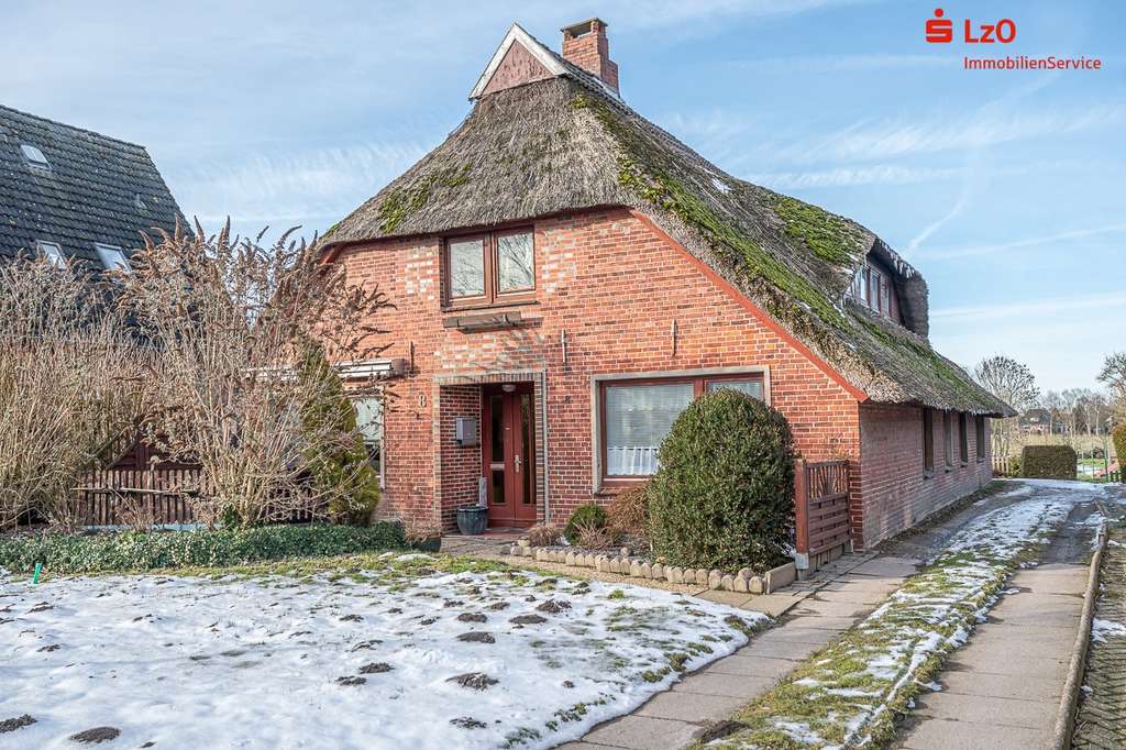 Immobilie in Stadland - Charmantes Reetdachhaus in idyllischer Lage - Bild 0