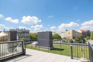 Modernes Townhouse-Studio mit privater Dachterrasse & TG-Stellplätzen in Bestlage