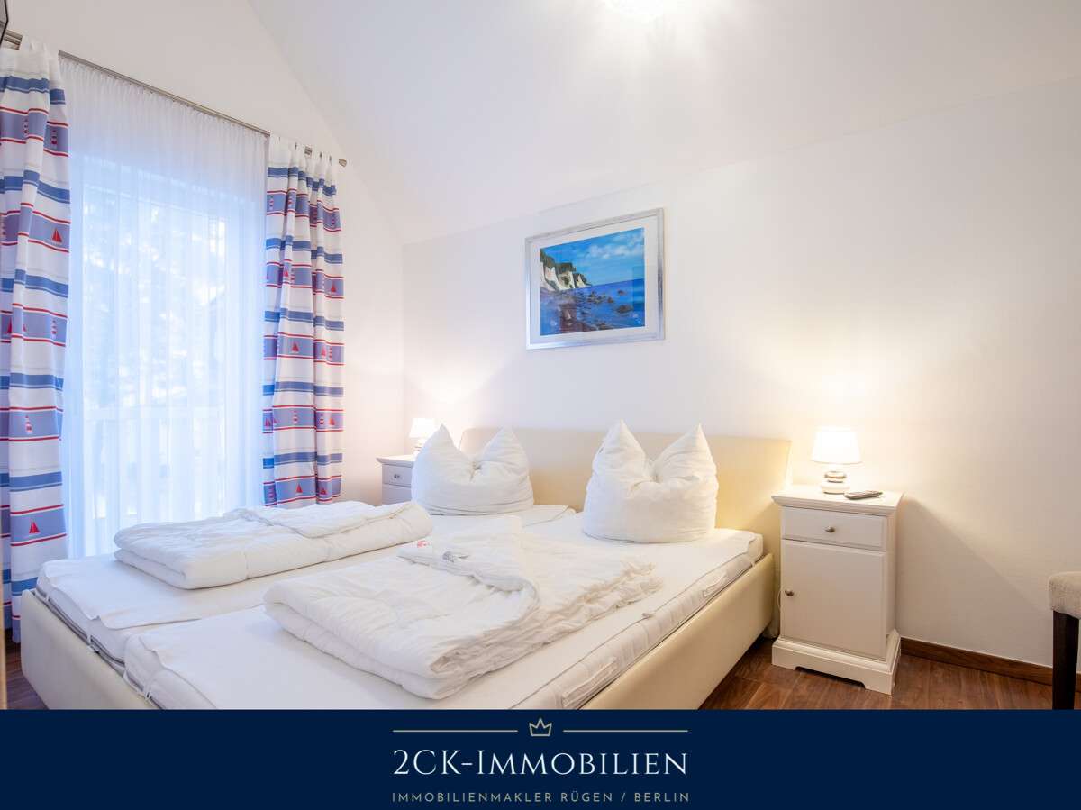 Immobilie in Glowe - 2 Zimmer Premium Ferienwohnung in Glowe, strandnah, zwei Balkone, Sauna, Kamin, inkl. Stellplatz! - Bild 1