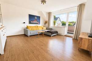 Familienfreundliche Wohnung mit Garten, Carport und Garage