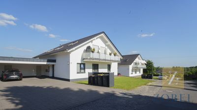 ZWEI FAMILIEN, EIN ZUHAUSE: MODERNES WOHNEN AUF HÖCHSTEM NIVEAU IN WOLPERATH