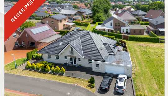 Bild von Familientraum auf zwei Ebenen – Großzügiger Bungalow mit Dachausbau und Garten