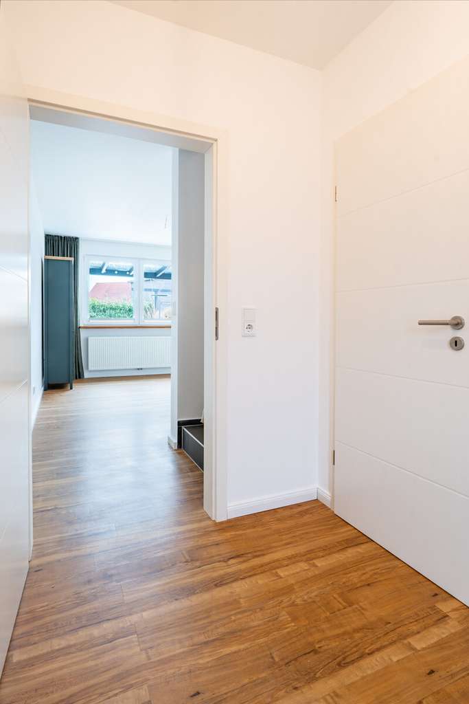 Immobilie in Osdorf - Lichtdurchflutetes Reihenendhaus mit Platz für die kleine Familie - Bild 3