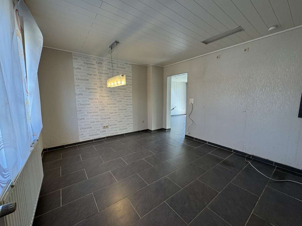 Immobilie in Erkelenz - Gemütliches Zweifamilienhaus mit Garten und zwei Garagen in Erkelenz-Gerderath - Bild 4