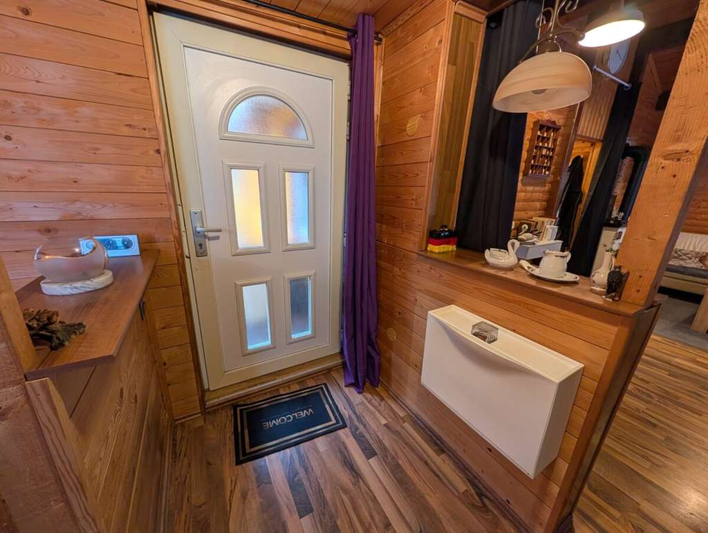 Immobilie in Vollersode - Großzügiges Grundstück im Grünen – charmantes Haus mit viel Platz für Mensch & Tier - Bild 2