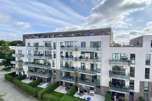 2,5 Zimmer in schönem Neubau und sehr gepflegter Außenanlage – Süd-West-Terrasse und kleiner Garten!