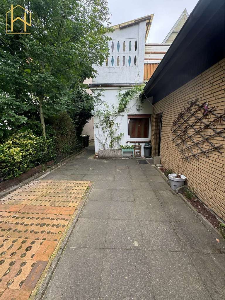 Immobilie in Melle - Solides Zweifamilienhaus mit gesicherten Mieteinnahmen und Eigennutzungspotenzial - Bild 3