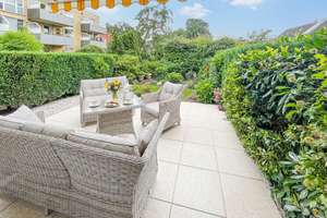 Gartenwohnung mit Terrasse und Südausrichtung und TG-Platz!