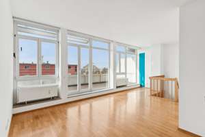 Helle großzügige Dachterrassen-Maisonette Wohnung in Bogenhausen mit Alpenpanorama