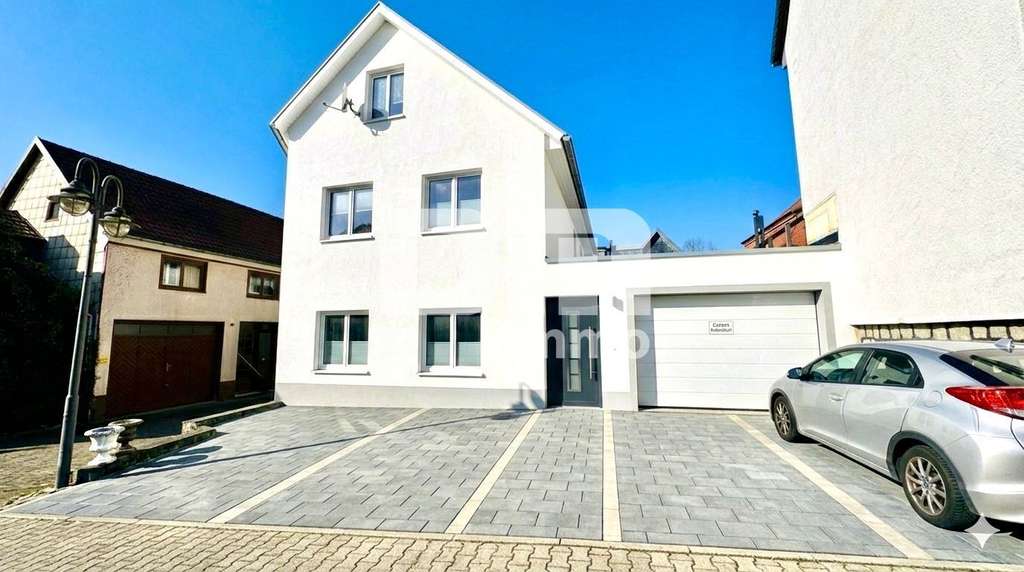 Immobilie in Dingelstädt - Vollständig kernsaniertes / neu erstelltes EFH in zentraler Lage mit 2 Garagen - Bild 2