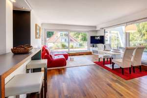 Harlaching: Penthouse-Juwel in der Menterschwaige – Stil, Licht und Ruhe vereint