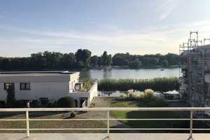 Direkter Rheinblick mit großer Terrasse