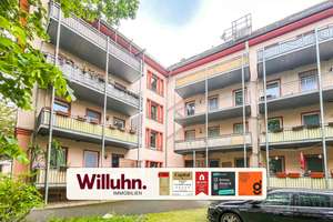 Attraktive Wohnung im 1. Obergeschoss mit Balkon und Tageslichtbad