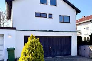 Zum Glück für die Familie – Ihr neues Zuhause  großes 2-Familienhaus mit Doppelgarage  Im Geiger