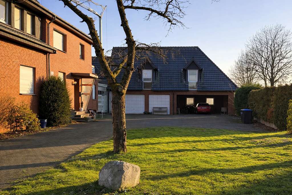 Immobilie in Herzebrock-Clarholz - Wohn- und Geschäftshaus mit Entwicklungspotential - Bild 1