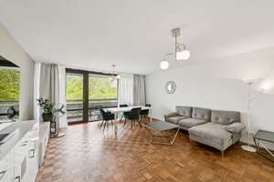Wohnkomfort auf höchstem Niveau: Modernisierte 3-Zimmer-Wohnung mit 2 Balkonen, Aufzug & Tiefgarage
