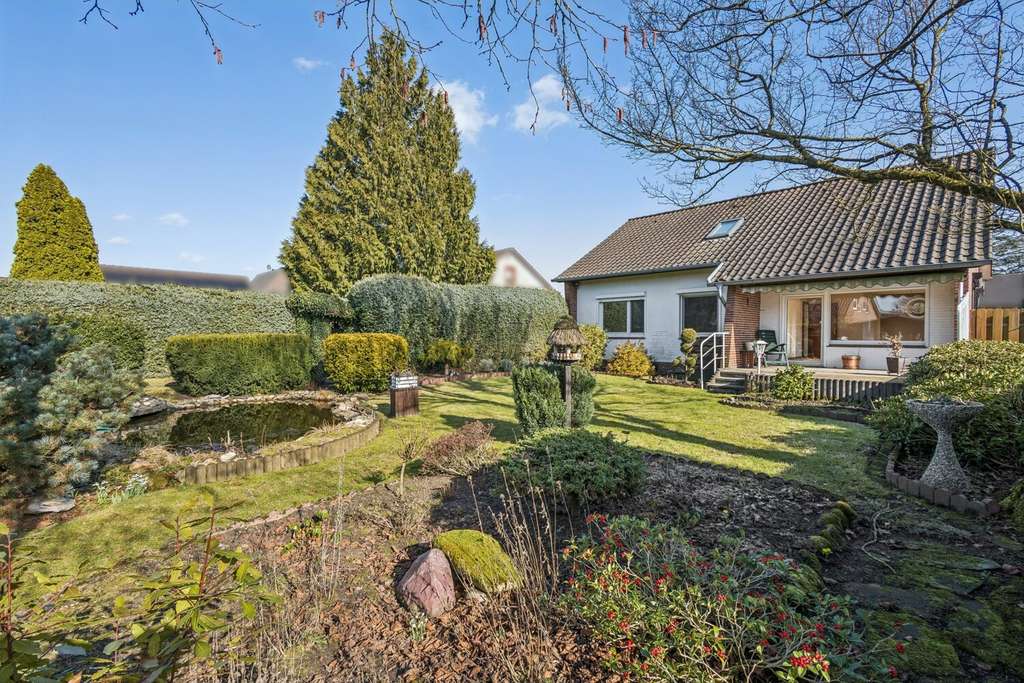 Immobilie in Schneverdingen - Familienfreundliches Einfamilienhaus mit Gartenparadies - Bild 1