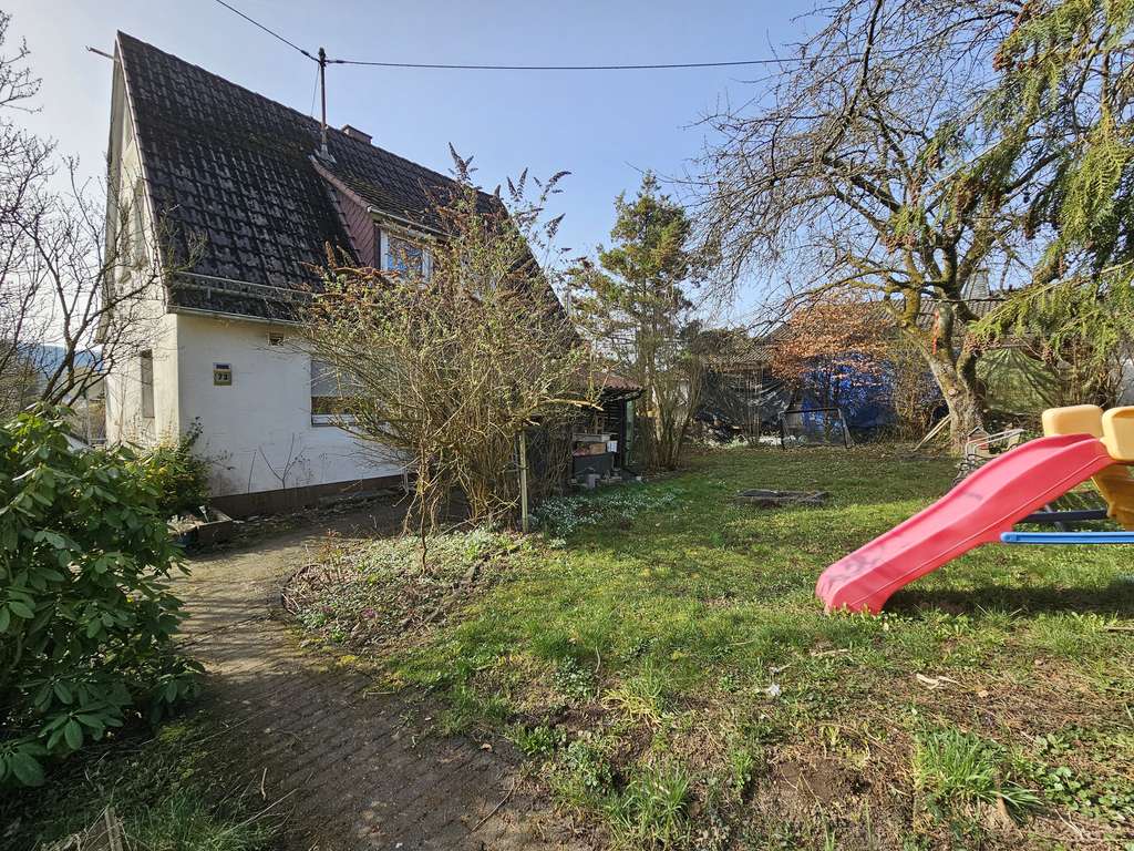 Immobilie in Freudenberg - Gemütliches Einfamilienhaus in sonniger Lage mit großer Terrasse, XL-Garage und schönem Fernblick - Bild 0