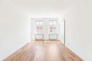 Lichtdurchflutete und sanierte 2-Zimmer-Wohnung mit freiem Ausblick