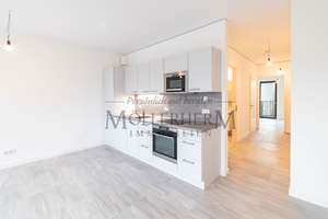 Moderne Neubauwohnung in Berlin-Mitte mit Einbauküche, 2 Balkonen und Blick ins Grüne