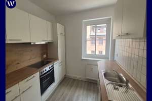 Zentral & ruhig mit Blick ins Grüne: Helle 2 Zimmer + Einbauküche + Laminat + Bad mit Fenster – Wollenweberstraße 8, 18055 Stadtmitte, Rostock – Vorschaubild 1