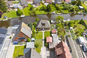 Ruhig und direkt am Wasser: renovierter 4-Zimmer-Bungalow in Loppersum, Hinte. Provisionsfrei! – Loppersumerstraße 24, 26759 Hinte – Vorschaubild 7