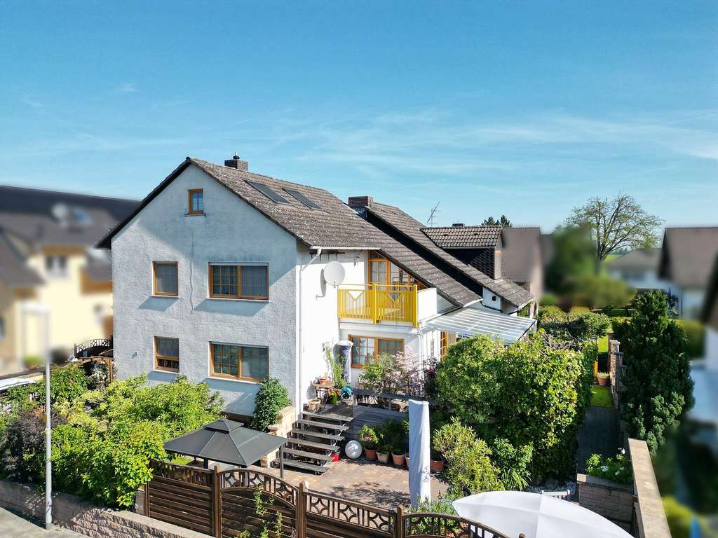 Immobilie in Riedstadt - Großzügig wohnen, professionell arbeiten – Haus mit separatem Bürobereich - Bild 0