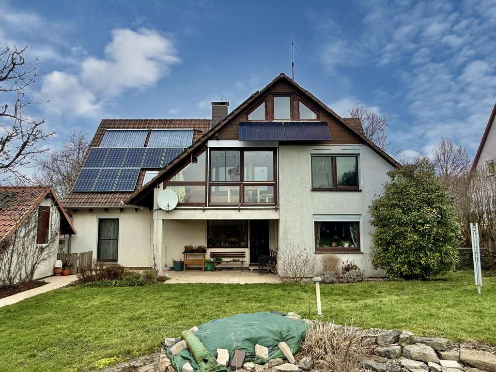 Immobilie in Friedland - Zweifamilienhaus mit Fernblick und außergewöhnlichem Grundstück in Ortsrandlage von Groß Schneen - Bild 1