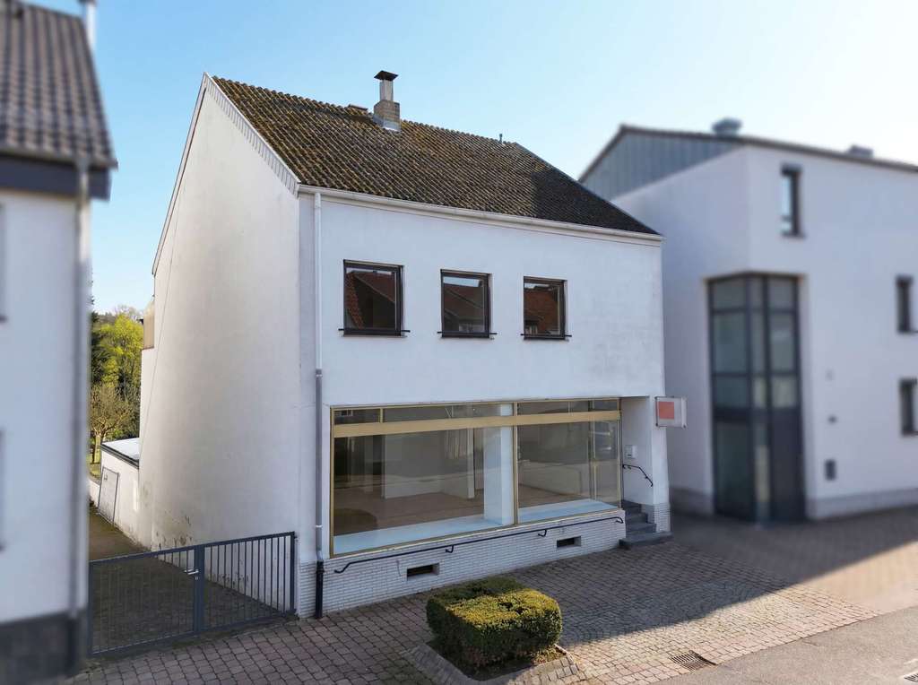 Immobilie in Kirkel - Wohn- und Geschäftshaus mit Carport und Garten - Bild 0