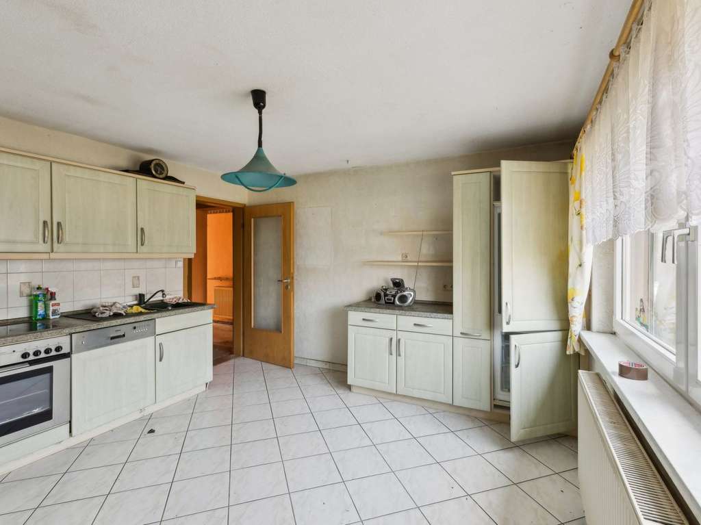 Immobilie in Leegebruch - Charmante Doppelhaushälfte in Leegebruch – Handwerkerobjekt mit Ausbaumöglichkeiten - Bild 3