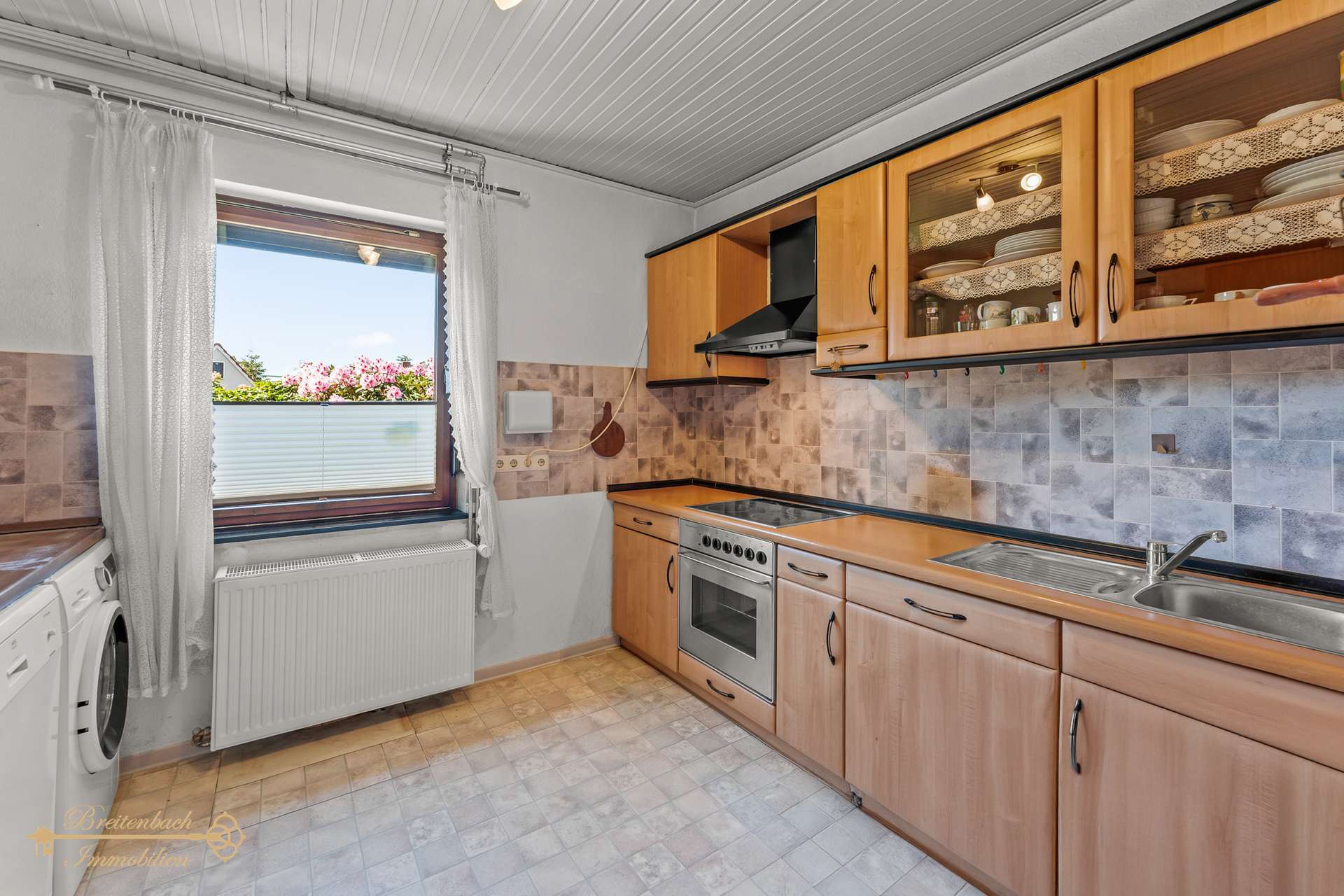 Immobilie in Elsfleth - Ihr neues Zuhause mit Charme, Kamin und liebevoll gestaltetem Garten - Bild 0