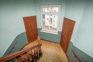 Großzügige 4-Zi-Etagenwohnung mit Balkon und Gartenanteil