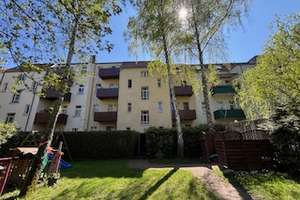 Stilvoll saniertes Mehrfamilienhaus mit Vorgarten in Zentrumslage