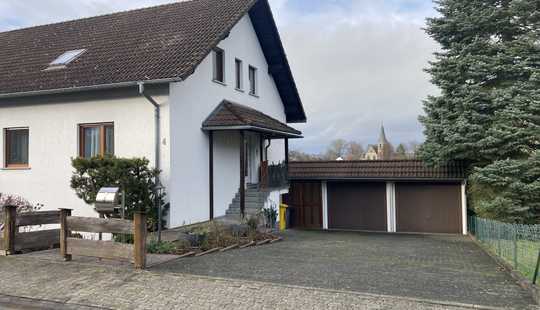 Bild von Großzügiges Mehrfamilienwohnhaus mit Doppelgarage