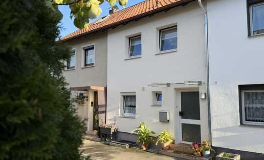 Ihr Weg zum Eigenheim - Gepflegtes Mittelhaus mit kleinem Garten