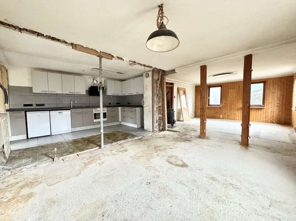 Wohn- und Esszimmer mit Küche