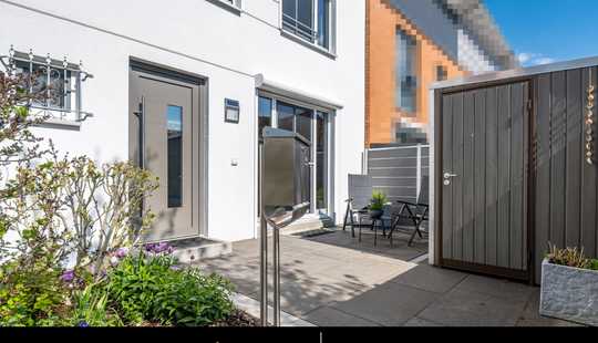 Bild von Modernes Wohnen im grünen Boberg: Mittelreihenhaus mit Gartenidylle und zwei Stellplätzen