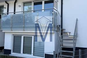 Neuwertige 3-ZKB-Maisonette mit großem Balkon, Gartenanteil und  Garage im EG / Souterrain