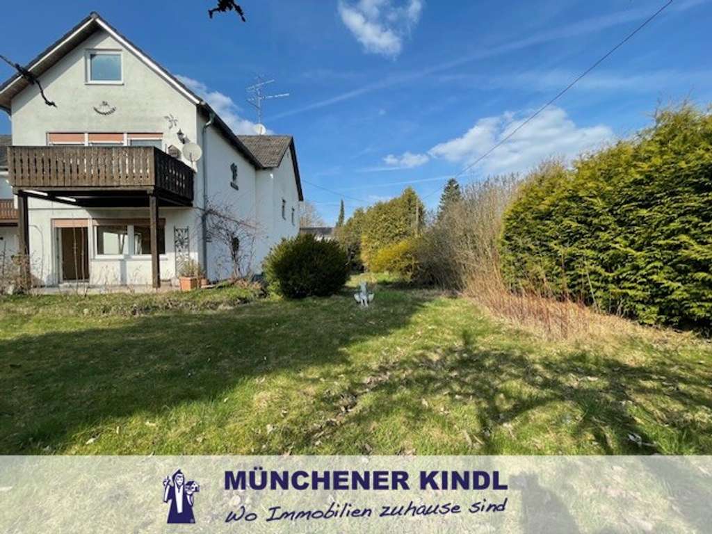 Immobilie in Ismaning - Rarität in Ismaning: Doppelhaushälfte auf 850 m² Traumgrundstück mit Potenzial - Bild 0