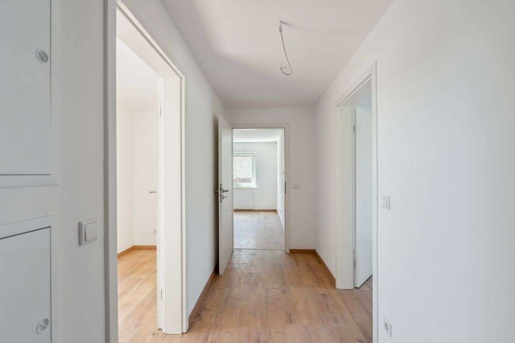 Immobilie in Lauf an der Pegnitz - Modernisierte Dachgeschosswohnung in Lauf/Simonshofen – stilvoll, effizient, rentabel - Bild 0
