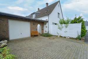 Ihr Projekt in Hitdorf – Doppelhaushälfte mit großem Garten und Möglichkeiten