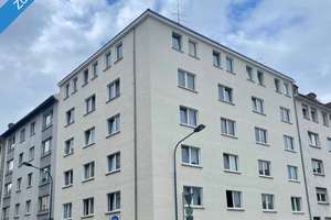 Gepflegtes Mehrfamilienhaus mit 15 Wohneinheiten, Gewerbeeinheit und Garagen in Top-Wohnlage